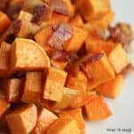 close up picture of roasted sweet potatoe chunks with bacon