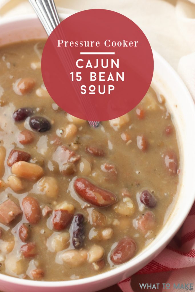 Bowl of Cajun 15 bean soup cooked in a pressure cooker. Text reads "Pressure cooker Cajun 15 bean soup"