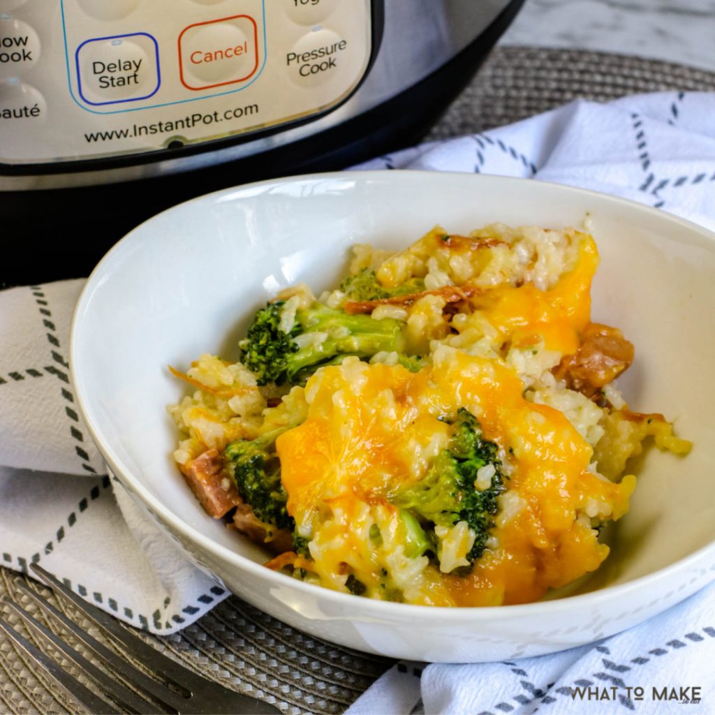 Bowl that contains ham, broccoli, and rice casserole