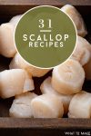 Scallops sitting on a cutting board. Text Reads "31 Scallop Recipes"