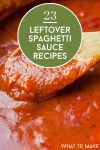 wooden spoon in spaghetti sauce. Text reads "23 Leftover spaghetti sauce recipes"